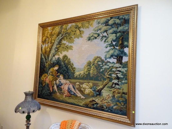 (LR) FRAMED TAPESTRY; LARGE FRAMED TAPESTRY OF YOUNG COUPLE TENDING SHEEP IN GOLD FRAME- 72 IN X 60