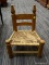 (R1) STRAW CHILD'S CHAIR; SLAT BACK CHILD'S CHAIR WITH TURNED DETAILING.