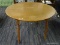 (R2) KITCHEN TABLE; ROUND, WOODEN, 4-SEATER KITCHEN TABLE WITH TURNED POLE LEGS. SIDE OF THE TABLE