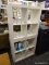 MODERN BOX CUBBY SHELVING UNITS; PAIR OF OPEN BACK 2 X 2 BOX SHELVING UNITS, WHITE IN COLOR.