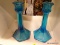 PAIR OF CANDLE HOLDERS; TWO BLUE FROSTED GLASS CANDLE HOLDERS. MEASURES 9 IN TALL.