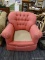 (R3) SHELLBACK ARMCHAIR; BUTTON TUFTED SHELL BACK STYLE ARM CHAIR WITH ROLLING ARMS AND PINK