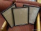 (R4.5) WOODEN FRAMES; SET OF 3 WOODEN, BLACK WITH GOLD TONE TRIM PICTURE FRAMES. MEASURES 12 IN X 15