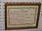 (LWALL) MOTHER'S DAY NEEDLEPOINT; FRAMED NEEDLEPOINT WITH A MOTHER'S DAY POEM. SITS IN WOODEN FRAME.