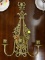 (R1) BRASS SCONCE; ORNATE BRASS SCONCE WITH THREE CANDLESTICK HOLDERS.MEASURES 18.75 IN TALL.