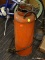 VINTAGE MANUAL SPRAY CANISTER; RED VINTAGE SPRAY CANISTER WITH ATTACHED SPRAY HOSE. READS 