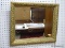 (RWALL) WALL HANGING MIRROR; HORIZONTAL MIRROR SITTING IN A BRONZE PAINTED FRAME WITH SHELL AND