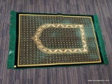 (R2) SELIN KADIFE PRAYER MAT; MADE IN TURKEY WITH A GREEN, GOLD TONE, AND BEIGE DESIGN. HAS GREEN