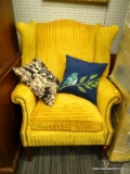 (R1) WING BACK ARM CHAIR; MULTI-TONED YELLOW FABRIC WINGBACK ARMCHAIR WITH NAILHEAD DETAILING. SITS