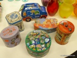 (R3) LOT OF DECORATIVE TINS; 7 PIECE LOT OF DECORATIVE TINS TO INCLUDE A CAR-SHAPED M & M TIN, A