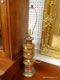 (BWALL) TABLE LAMP; TURNED WOODEN TABLE LAMP. NEEDS LAMPSHADE. MEASURES 28 IN TALL.