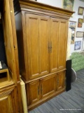 (R1) ENTERTAINMENT ARMOIRE; WOODEN, 2 SLID IN DOOR ENTERTAINMENT ARMOIRE THAT OPENS TO REVEAL 2 TOP