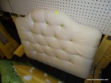 (R1) TWIN SIZE HEADBOARD; HAS WHITE UPHOLSTERY AND BUTTON TUFTED WITH GREEN BUTTONS. TWIN SIZE