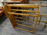 (R4) QUILT RACK; WOODEN QUILT RACK WITH SOLID WOOD PLANK SIDES. MEASURES 30 IN X 9 IN X 3 FT.