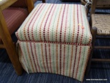 (R4.5) OTTOMAN; SMALL SQUARE, ORANGE CREAM COLORED OTTOMAN WITH AUTUMN COLORED CLOTH BUTTON STRIPES.