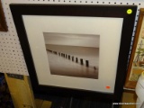 (LWALL) BEACH PHOTOGRAPH; SHOWS BLACK AND WHITE PHOTOGRAPH OF AN ABANDONED PIER. MATTED IN WHITE AND