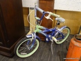 (R1) AVIGO CORAL MIST GIRL'S BICYCLE; GREEN AND PURPLE GIRLS BICYCLE WITH WHITE PEDALS, A KICKSTAND,