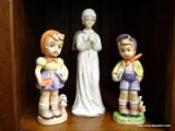 (R1) LOT OF FIGURINES; THREE PIECE LOT TO INCLUDE TWO CERAMIC SCHOOLCHILDREN FIGURINES (ONE OF A BOY