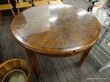 (R2) ROUND KITCHEN TABLE; WOODEN, 4-SEATER, ROUND KITCHEN TABLE WITH A CARVED DETAILED TRIM. SITS ON