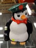 (R2) COCA-COLA PENGUIN COOKIE JAR; 1997, COKE PENGUIN DELIVERY MAN COKE COOKIE JAR. MEASURES 11 IN