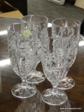 (R2) SET OF WINE GOBLETS; 4 PIECE LOT OF CRYSTAL WINE GOBLETS WITH A PALM TREE LIKE DESIGN.