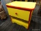 (R2) 1 OF A PAIR OF ASHLEY FURNITURE KID'S FIRST SIDE TABLES; CHILDS SIDE TABLE, RED AND YELLOW IN