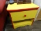 (R2) 1 OF A PAIR OF ASHLEY FURNITURE KID'S FIRST SIDE TABLES; CHILDS SIDE TABLE, RED AND YELLOW IN