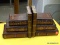 (R2) THREE HANDS BOOKENDS; WOODEN BOOKENDS SHAPED AND PAINTED AS THREE OLD BOOKS STACKED NEXT TO A