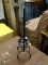 (R2) JEWELRY STAND; METAL JEWELRY STAND WITH 12 HOOKS. MEASURES 16.5 IN TALL.