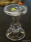 (R2) GLASS CANDLE STICK; HAS A DS STICKER ON IT. MEASURES 6.25 IN TALL.