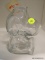 (R3) SNOOPY BANK; CLEAR GLASS, ANCHOR HOCKING 1960'S, 6 IN SNOOPY COIN BANK.