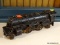 (R3) VINTAGE LIONEL TOY TRAIN; MARKED #1120. HAS A SWITCH ON THE TOP.