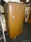 (R4) RETRO AMC REFRIGERATOR; BROWN PAINTED VINTAGE AMC REFRIGERATOR WITH A TOP DOOR THAT OPENS TO