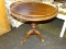 (R4) GALLERY TOP PEDESTAL TABLE; WOODEN, FLIP-TOP, SINGLE PEDESTAL, ROUND GALLERY TOP TABLE. HAS