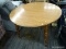 (R4) KITCHEN TABLE; ROUND KITCHEN TABLE WITH 4 TURNED LEGS WITH BULB FEET AND BOW TIES ON THE KNEES.