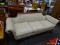 (R4) ANTIQUE EMPIRE STYLE SOFA; 3-CUSHION, EMPIRE STYLE SOFA WITH A BEIGE FLORAL UPHOLSTERY, ROLLING