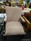 (R4.5) ARM CHAIR; PINK UPHOLSTERED ARM CHAIR WITH AN H STRETCHER. COMES WITH A PEACH THROW PILLOW.