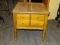 (R4.5) END TABLE; WOODEN END TABLE WITH A SINGULAR, 4 PANELED DOVETAIL DRAWER WITH 4 METAL KNOBS.