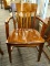 (R1) SLAT BACK DESK CHAIR; WOODEN SLAT BACK ARMCHAIR WITH TAPERED BLOCK LEGS. MEASURES 20 IN X 19.5