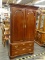 (R1) ETHAN ALLEN ARMOIRE; WOODEN CHIPPENDALE STYLE ARMOIRE WITH DENTAL DETAILING AT TOP ABOVE TWO
