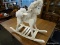 (R1) CHILD'S ROCKING HORSE; SMALL ROCKING HORSE, WHITE IN COLOR. INCLUDES HANDLES AND FAUX LEATHER