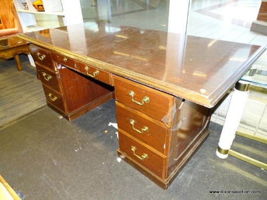 (WINDOW) EXECUTIVE DESK; CHERRY EXECUTIVE DESK WITH 2 LOWER FILE DRAWERS, A CENTER DRAWER AND 2