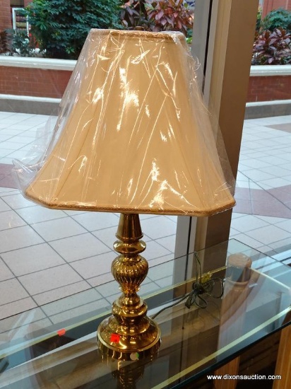 (WINDOW) TABLE LAMP; BRASS, TURNED TABLE LAMP WITH SHELL DETAIL ACCENTS AT THE MIDDLE. COMES WITH A