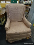 (R2) W.J. SLOANE INC CUSHIONED ARMCHAIR WITH COVER; ARMCHAIR WITH ORANGE BLOCK PATTERNED UPHOLSTERY