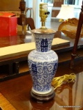(R2) ORIENTAL TABLE LAMP; PORCELAIN URN SHAPED TABLE LAMP AND PAINTED WITH BLUE LEAF AND FLORAL