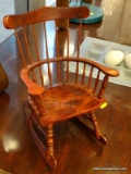 (WINDOW) DOLL ROCKING CHAIR; CHERRY FINISHED WOODEN, WINDSOR STYLE, DOLL'S ROCKING CHAIR.