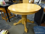 (R3) PEDESTAL KITCHEN TABLE; SINGLE PEDESTAL, OAK KITCHEN TABLE WITH AN 18 IN LEAF. SITS ON A 4