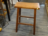 (R3) JOHN THOMAS BAR STOOL; WOODEN, SADDLE SEAT BAR STOOL. SEAT MEASURES 17.25 IN X 9.25 IN X 2 FT.