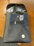 (R3) VINTAGE BLACK BAG; BAG WITH BUTTON LATCHING TOP FLAP AND A HANDLE. MAY HAVE BEEN USED FOR A