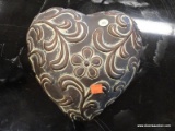 (R3) HEART DECORATION; POTTERY ART, HEART SHAPED DECORATION WITH FLORAL ACCENTS AND A BROWN PAINT